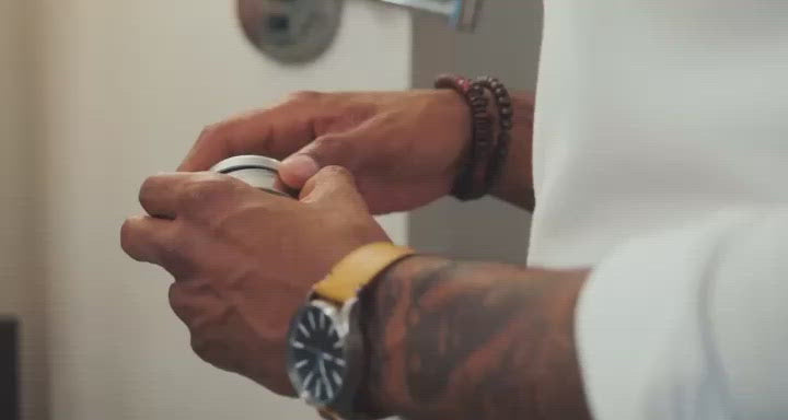 Opulent Grooming Beard Balm application tutorial: Man demonstrating proper technique for applying and styling beard with premium balm.